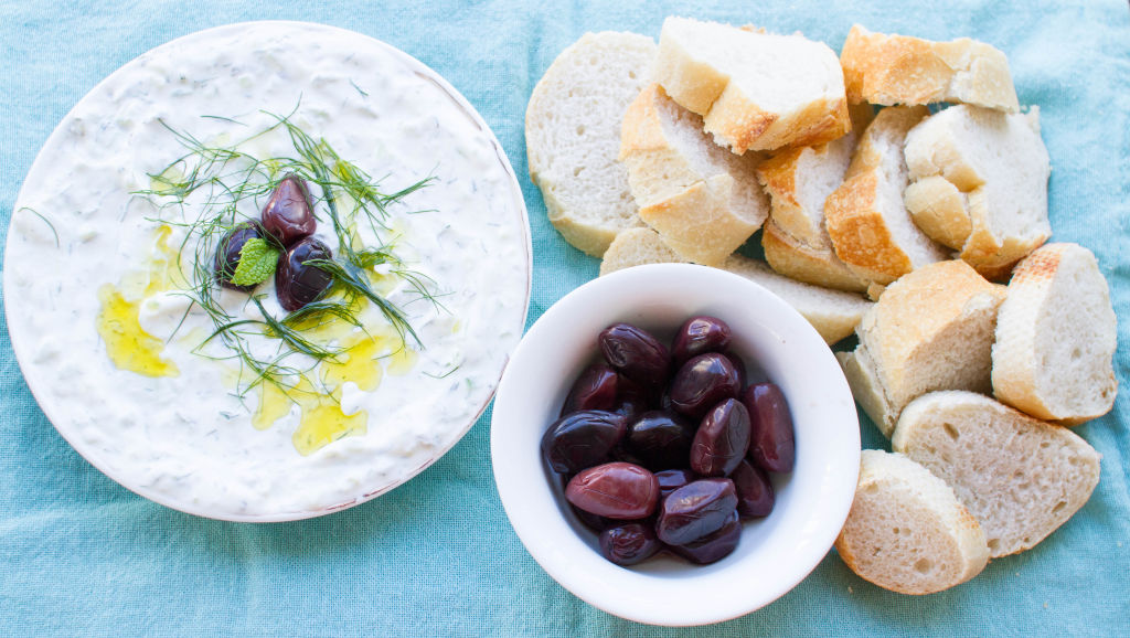 Tzatziki, Olives and Fresh Baguette are  great to serve your friends over cocktails.