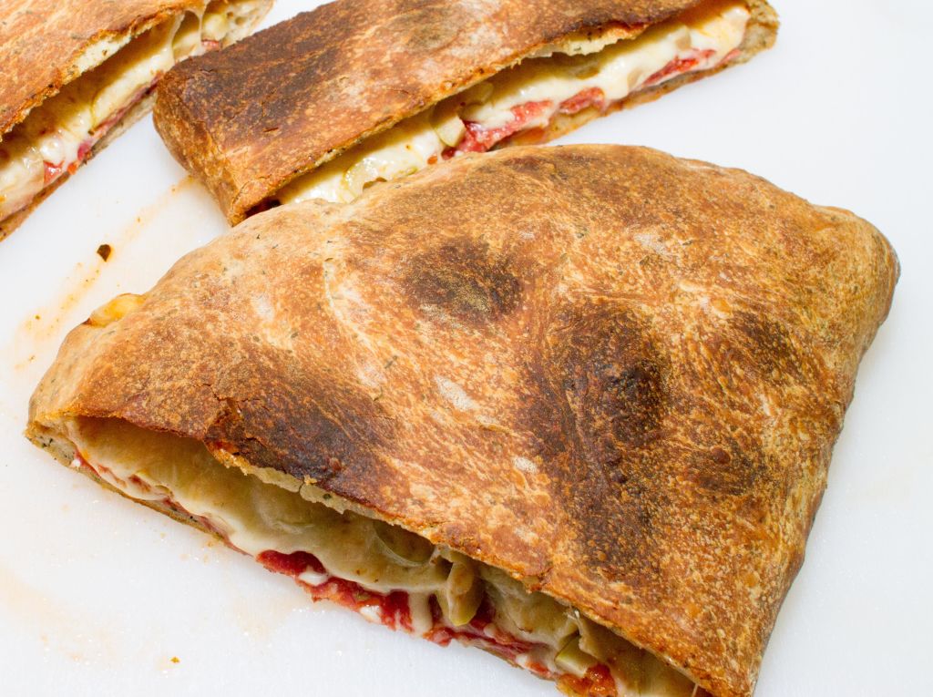 SERVE THE CALZONE WITH A LIGHT SIDE SALAD